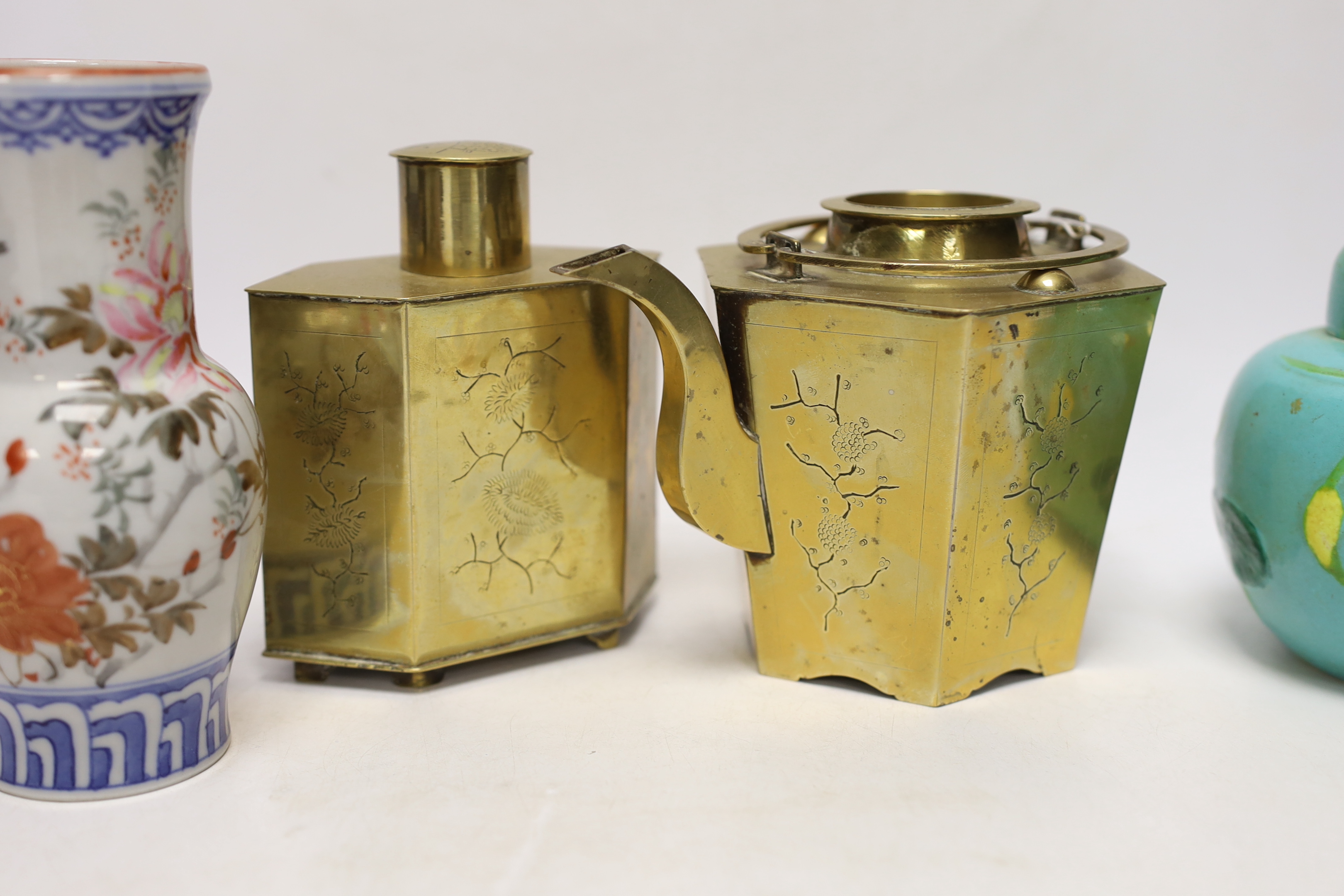 Chinese items including a brass tea caddy and kettle, blue and white porcelain bowls and a Japanese vase